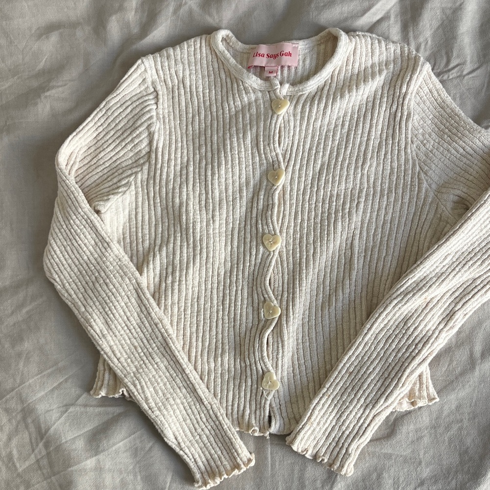 Lisa Says Gah Cream Ribbed Cardigan with Heart Button
